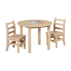 a wooden table and two chairs with books on top