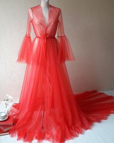 Fitted Tulle Dress With Long Sleeves, Fitted Long Sleeve Tulle Dress, Red Fitted Organza Gown, Fitted Tulle Gown With Long Sleeves, Fitted Long Sleeve Tulle Gown, Fitted Tulle Gown With Sheer Sleeves, Fitted Long Sleeve Organza Gown, Fitted Dress With Sheer Sleeves And Full Length, Fitted Full Length Dress With Sheer Sleeves