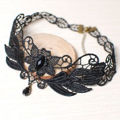 A beautiful Black Lace Choker Necklace Gothic style hand made with unique elaborate floral Victorian design. A wonderful piece to match your dress for work or evening gowns for special occassion. Elegant Adjustable Jewelry For Masquerade, Black Bohemian Jewelry For Party, Bohemian Black Jewelry For Party, Black Flower Necklace For Party, Elegant Flower Decorated Choker Jewelry, Elegant Flower Decoration Choker Jewelry, Vintage Black Choker For Festival, Elegant Black Bead Jewelry For Festival, Vintage Black Festival Choker