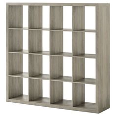 an open bookcase with several compartments on the front and sides, all in dark brown wood