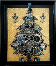 a christmas tree made out of clocks and other items in a black frame on a wall