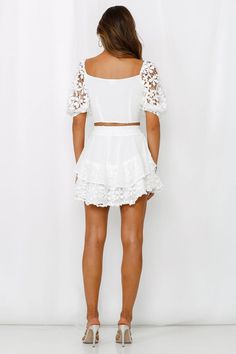 Length from waist to hem of size S: 39cm. White mini skirt. Lined. Cold hand wash only.  Model is a standard XS and is wearing size XS.  True to size.  Lightweight, crochet lace shell; sheer chiffon contrast. Shirred, elasticised waist.  No zipper. Slip-on style.  Floral placement may vary. Polyester.   It has ruffles, it has floral-themed lace, what could be better than the Cottagecore Skirt Made to cater to the farmgirl aesthetic you鈥檝e been loving on Instagram, the Cottagecore Crop + Skirt will definitely be your next Springtime edit! We admit wee low key obsessed with the floaty ruffle style and the contrasting chiffon overlay over the top! Wee teaming ours with woven jute mules, a matching straw sun hat and fine gold jewellery, ready to pick the flowers and frolic in the fields! Cottagecore Skirt, Crop Skirt, White Mini Skirt, Chiffon Overlay, Ruffles Fashion, Skirt White, Farm Girl, Sheer Chiffon, White Crop Top