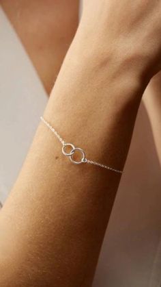 Our sweet Interlocking Circles Bracelet is minimal, modern, and timeless. >> Interlocking Circles Bracelet: https://pinealvisionjewelry.com/products/interlocking-circles-bracelet Modern Adjustable Infinity Jewelry, Minimalist Round Charm Bracelet, Elegant Everyday Charm Bangle Bracelet, Elegant Everyday Bangle Charm Bracelet, Everyday Elegant Bangle Charm Bracelet, Elegant Adjustable Circular Chain Bracelet, Minimalist Round Charm Bracelet For Everyday, White Gold Charm Bracelet For Everyday, Minimalist Charm Bracelet For Wedding