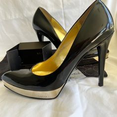 Brand New Size: 8.5b Sophisticated And Sexy Black Patent Leather Heels With Mirror-Like Platform Gucci Dust Bag, Extra Set Of Heel Taps, And Small La Storia Book Included Pointed Toe Gold Leather Lining And Black Leather Sole Platform Is Approx. .75 Inches Heel Is Approx. 5.5 Inches Made In Italy Gucci High Heels For Office, Gucci Patent Leather Heels, Gucci Fitted Evening Heels, Chic Gucci Heels For Office, Modern Formal Gucci Heels, Gucci Black Heels With Sculpted Heel, Black Gucci Heels With Sculpted Heel, Gucci Patent Leather High Heels, Chic Gucci Heels With Reinforced Heel