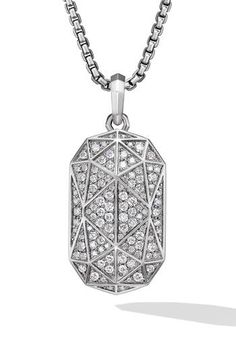 Sterling silver. Pavé diamonds, 2.16 total carat weight. Amulet, 47.9 x 21.1mm. Amulet drop length, 36.3mm. Please note: amulet only; chain sold separately. This item can be engraved. Imported. >Diamond Guide Luxury Octagon Diamond Necklace, Luxury Silver Diamond Necklace With Single Cut Diamonds, Luxury Pave Set Drop Jewelry, Luxury Drop Jewelry With Pave Setting, Luxury Silver Diamond-shaped Diamond Necklace, Luxury Diamond Necklace With Octagon Diamond Accents, Luxury Octagon Diamond Necklace With Diamond Accents, Luxury Octagon Diamond Necklace With Accents, Modern Silver Diamond-cut Necklace