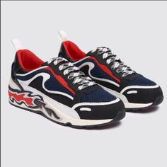 Sandro Flame Sneakers. Size Eu 40/ Usa 9-9.5. Color-Dark Navy. A Very Technical Manufacturing Process With An Intricate Sole And A Combination Of Mesh, Neoprene And Calfskin Materials. Heel Height: 3 Centimeters. Materials: Main Fabric: 100% Polyester. Secondary Fabric: 85% Polyester, 15% Elastane. Leather: 100% Cow. Upper Side: 100% Cow. Yoke: 100% Calfskin. Outer Sole: 100% Rubber. Lining: 100% Polyester. Sock Lining: 100% Polyester. Nwt. Red Sole Round Toe Jogging Sneakers, Navy Sneakers With Vibram Sole For Streetwear, Sporty Slip-on Running Shoes With Red Sole, Jogging Sneakers With Red Sole And Round Toe, Navy Slip-on Sporty Sneakers, Navy Sporty Slip-on Sneakers, Navy Lace-up Casual Custom Sneakers, Sports Slip-on Sneakers With Red Sole, Dynamic Low-top Sneakers With Red Sole