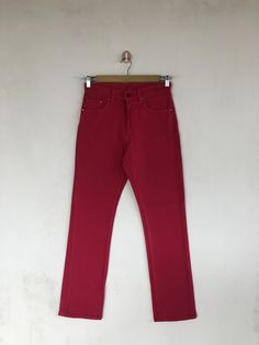 Vintage Levis Jeans Pink Levis 554 Denim Pants - BS40267.  Manual Measurement (laying in flat area):  1) Waist: 28 inch.  2) Rise: 10.8 inch.  3) Hips: 19 inch.  4) Tight: 9.5 inch.  5) Outseam: 40.5 inch.  6) Inseam: 29.5 inch.  7) Leg opening: 7.5 inch.  Made In: JAPAN.  Fabric Material: 100% Denim Cotton.  Condition: In good vintage condition overall.  Please check all the measurement to ensure a proper fit.  Remember to allow yourself some extra room for movement.  You can compare these info Streetwear Stretch Jeans In Straight Cut, Slim Fit Straight Leg Streetwear Pants, Slim Fit Straight Leg Pants For Streetwear, Casual Fitted Straight Jeans, Streetwear High Rise Slim Fit Bottoms, Slim Fit Straight Leg Bottoms For Streetwear, Slim Fit Full Length Cotton Jeans, High Rise Slim Fit Bottoms For Streetwear, High Rise Slim Fit Jeans For Streetwear