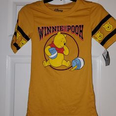 Disney Baseball Tee With Winnie-The-Pooh. Junior X Small With Defects. Please See Pictures Obo Sporty Mickey Mouse Crew Neck Top, Disney Fan Merchandise Top, Pre-shrunk, Disney Letter Print Tops For Streetwear, Playful Tops With Character Print For Fan Merchandise, Playful Short Sleeve Top For Fan Merchandise, Mickey Mouse Short Sleeve Top For Fans, Disney Short Sleeve Tops For Fan Merchandise, Disney Fan Merchandise Short Sleeve Tops, Sporty Tops With Character Print For Fans