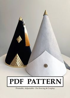 two black and white hats with gold trim