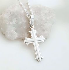 Let this sterling silver cross necklace inspire you in your Christian journey. This Cross will bring you great joy while you proudly wear it as a symbol of your faith. If you need the cross engraved, please use this link to add the engraving service: https://etsy.me/30lndjH  Cast using 100% sterling silver, no pewter, nickel or lead was used to create this piece, buy with peace of mind.   . Collection Small Crosses this link            http://etsy.me/1D8fIPo .  Great collection of Crosses this l Engraved Cross Necklace For First Communion, Silver Engraved Necklace For First Communion, Engraved Silver Necklace For First Communion, Personalized Cross Pendant Necklace For First Communion, Boys Cross Necklace, Om Jewelry, Silver Cross Necklace, Sterling Silver Cross Necklace, First Communion Gifts