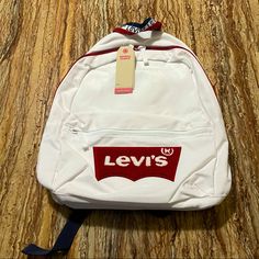 Levi’s Backpack White Red Batwing Levi’s Logo Brand: Levi’s Color: White | Red Sherpa Size: 16.5” X 11” X 6” Approx. Condition: Brand New With Original Tags Same Day Shipping Via Usps Functional Red School Backpack, Cheap Red School Backpack, Red School Backpack Softback, Themed Red Backpack, Red Kanken Backpack, Velvet Matching Set, Ugg Sandals, Purple Backpack, Backpack Brands