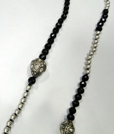 Designer 925 sterling silver and Genuine uncut Diamond set beads, Black spinal Gemstones beads, sterling silver Beads Strand. Beautiful one of the kind piece in very good condition. Length-74 cm( we can adjust length). Size of Diamond bead-17/21 MM and 13/16 MM, size of black gemstone beads-8 Unique Silver Jewelry With Black Beads, Silver Long Beaded Necklace With Black Beads, Silver Beaded Necklace With Black Beads In Sterling Silver, Sterling Silver Beaded Necklaces With Black Beads, Sterling Silver Beaded Necklace With Black Beads, Spiritual Silver Beaded Necklaces With Faceted Beads, Silver Long Beaded Necklace With Gemstone Beads, Unique Silver Beaded Necklace With Faceted Beads, Bohemian Silver And Black Beads