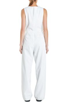 Fall for the sophisticated silhouette of this jumpsuit designed with polished pinstripes and a vest bodice. Front button closure V-neck Sleeveless Back welt pockets Lined 96% polyester, 4% spandex Hand wash, dry flat Imported Elegant Striped Sleeveless Jumpsuits And Rompers, Fitted Jumpsuits And Rompers With Vertical Stripes, Chic Striped Jumpsuits And Rompers For Work, Vest Bodice, Designer Jumpsuits, White Jumpsuit, Nordstrom Store, Wide Leg Jumpsuit, Welt Pockets