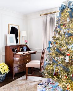 a decorated christmas tree in a living room