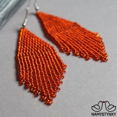 These orange beaded earrings are made of high-quality Czech beads and strong synthetic thread. They are elegant, fashionable, and highly versatile, suitable for everyday wear. Features: Sterling silver components Color: orange. This item is currently in stock. You must be completely satisfied. If you find merchandise unsatisfactory for any reason, return it within 10 days and your money will be refunded without questions. These earrings in gold color https://www.etsy.com/listing/660046267/gold-b Handmade Elegant Orange Beaded Earrings, Elegant Handmade Orange Beaded Earrings, Orange Beaded Earrings For Parties, Orange Round Beaded Earrings For Party, Elegant Orange Beaded Earrings As A Gift, Elegant Orange Earrings With Dangling Beads, Elegant Orange Beaded Dangling Earrings, Orange Beaded Earrings With Dangling Beads For Party, Orange Beaded Dangling Earrings For Party