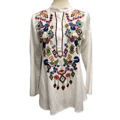 Women’s A & A White Button Neckline Tunic With Embroidered Flowers Long Sleeves New With Tags Attached Various Sizes 100% Viscose Approximate Measurements Taken Flat Small Armpit To Armpit 18”, Length 26” Medium Armpit To Armpit 20”, Length 26” X Large Armpit To Armpit 22”, Length 27” Arrives Clean And Ready To Wear From A Smoke Free Environment Casual White Blouse With Floral Embroidery, Multicolor Embroidery Long Sleeve Vacation Tops, Multicolor Embroidered Long Sleeve Beach Top, Long Sleeve Blouse With Multicolor Embroidery For Vacation, White Casual Top With Floral Embroidery, White Embroidered Long Sleeve Top, White Embroidered Long Sleeve Blouse, Long Sleeve Embroidered Top For Beach, White Bohemian Embroidered Tunic Top