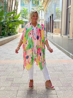 DESCRIPTION The Charlotte Kimono is soft and so pretty with bright simple florals. Works beautifully over white jeans- sophisticated and so chic. A beautiful layering piece that can be worn from Spring into Fall. Pair with one of our Amy tops in warm weather. Details and Care One Size 100% Viscose 39" L x 37" W Gentle cycle or hand wash. Dry flat. Imported Cruise Wear, Line Shopping, Designer Jeans, Turks And Caicos Islands, Layering Pieces, So Pretty, Trinidad And Tobago, Uganda, Brunei