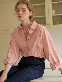 Cut from crisp cotton fabric, this relaxed fit shirt features casual open collars and buttoned front design. Wear yours alone, or layer with various items throughout the seasons.  - Intended for a loose fit- Comfortable dropped shoulders- Logo embroidery detail at cuff- Rounded hem design- Casual seam detail and chest pocket Everyday Pink Button-up Shirt, Classic Pink Cotton Blouse, Oversized Pink Blouse With Pockets, Oversized Pink Shirt With Pockets, Classic Pink Collared Shirt, Pink Button-closure Shirt For Everyday, Pink Relaxed Fit Button-up Shirt, Pink Everyday Shirt With Button Closure, Everyday Pink Shirt With Button Closure