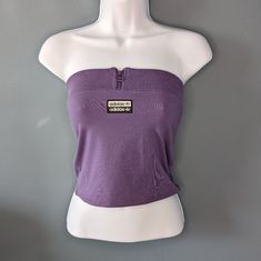 New With Tags Adidas Crop Tube Top Sleeveless Tank Zip Up At The Top Adidas Across The Chest Silicone Band Along The Top To Hold In Place Color: Tech Purple Size: Xs Condition: New Be50ct2-5952873 Y2k Stretch Strapless Top, Y2k Strapless Tank Top For Spring, Strapless Y2k Tank Top For Spring, Y2k Stretch Bandeau Tops, Y2k Bandeau Stretch Tops, Y2k Style Stretch Bandeau Tops, Y2k Fitted Bandeau Top, Stretch Bandeau Y2k Tops, Fitted Bandeau Top Y2k Style