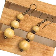 Small dangling wood earrings Wooden Bead Earrings, Easy Diy Gifts, Wooden Earrings, Wood Earrings, Brown Wood, Wooden Beads, Wood Beads, Beaded Earrings, Diy Gifts