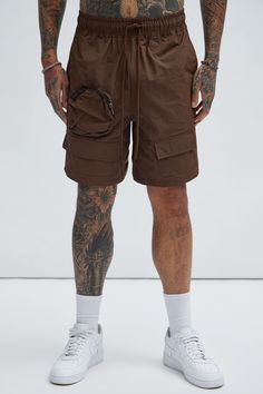 Available In Brown. Drawstring Elastic Waist Side Hand Pockets Back Pocket Utility Pockets 1 Zipper Pocket Shell: 100% Nylon Imported | Mens Safe Side Utility Nylon Shorts in Brown size Large by Fashion Nova Utility Nylon Shorts For Streetwear, Utility Shorts With Drawstring For Streetwear, Utility Drawstring Shorts For Streetwear, Utility Style Drawstring Shorts For Streetwear, Summer Nylon Shorts With Multiple Pockets, Utility Style Nylon Bottoms, Short Length, Streetwear Nylon Cargo Shorts With Multiple Pockets, Utility Nylon Shorts, Nylon Cargo Shorts With Pockets