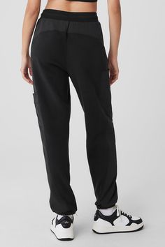 Made from a fleecy-soft fabric with smooth, contrasting panels down the legs, these pants are every bit as cozy as they look. They have a total of 4 pockets—2 on the sides, 2 on the legs—plus a stretchy high-rise waistband and stretchy cuffed hems for a jogger-style fit. Our advice? Get the matching jacket, too. Alo Yoga Relaxed Fit Sweatpants With Pockets, Alo Yoga Relaxed Fit Pants With Pockets, Black Tapered Joggers With Hip Pockets, Black Tapered Sweatpants With Cargo Pockets, Black Tapered Leg Sweatpants With Cargo Pockets, Athleisure Cargo Pants With Elastic Side Panels, Black Cargo Pocket Tapered Leg Sweatpants, Athleisure Full-length Sweatpants With Side Pockets, Functional Black Sweatpants With Side Pockets