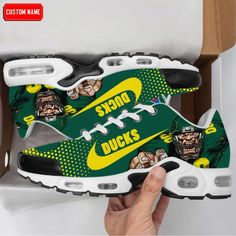 Oregon Ducks NCAA Premium Air Max Plus Sport Sneakers For Fan Gifts Synthetic Sneakers For Sports Events, Custom Sporty Sneakers With Logo For Sports, Sporty Custom Sneakers With Logo For Sports, Sporty Custom Synthetic Sneakers For Sports Events, Sporty Sneakers With Logo Print For Sports Events, Sporty Sneakers With Custom Logo For Sports, Team Sneakers For Game Day, Black Sneakers For Sports Events, Sporty Basketball Shoes With Logo