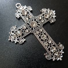 Presenting this Big Antique Silver Plated Alloy Rhinestone Cross Pendant perfect for making a fashion statement, big bling and glamour. Also suitable as embellishment for costumes or your arts and craft projects. Measurement: Approximately 67mm wide, 85mm long, 6mm thick, hole: 4mm. Canoga Park, Lace Mask, Arts And Craft, Rhinestone Cross, Silver Rhinestone, Arts And Crafts Projects, Cross Pendant, Fashion Statement, Handmade Natural