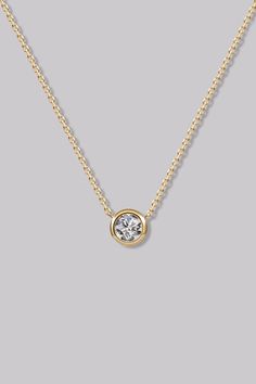 Round Diamond Necklace (0.24ct) - APM Monaco Classic Gold Diamond Necklace For Formal Occasions, Gold 14k Diamond Necklace With Single Diamond, Formal Yellow Gold Diamond Necklace, Classic Yellow Gold Solitaire Diamond Necklace, Classic 14k Yellow Gold Solitaire Necklace, 14k Yellow Gold Solitaire Necklace For Everyday Luxury, Yellow Gold 14k Solitaire Necklace With Brilliant Cut, Yellow Gold Solitaire Necklace In 14k Brilliant Cut, Classic Yellow Gold Diamond Necklace For Formal Occasions