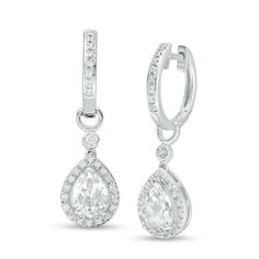 These exquisite diamond-touched drop earrings are a tantalizing look that doesn’t stop. Crafted in sterling silver, each earring glistens with a beautiful 8.0 x 6.0mm pear-shaped lab-created bright white sapphire outlined in glittering diamonds. A petite round bezel-set created sapphire accent and polished half-loop top the dangle, while additional created sapphires line the sculpted ear wire to complete this eye-catching style. Radiant with 1/5 ct. t.w. of diamonds and a brilliant buffed luster White Diamond-cut Teardrop Earrings, White Diamond Cut Teardrop Earrings, White Diamond Accented Teardrop Earrings, White Diamond Accents Teardrop Earrings, Bridal Dangle Earrings With Diamond Cut, Classic White Teardrop Earrings With Diamond Accents, White Gold Diamond-cut Teardrop Earrings, Diamond White Teardrop Earrings In Sterling Silver, White Gold Diamond Cut Teardrop Earrings