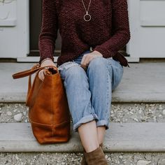 At first glance, you’ll notice the Madison Totes are a work of art. Now whether you choose full leather or waxed canvas is up to you, but as we like to say: “Either choice is the right choice.” But upon closer inspection you’ll realize the true genius to these totes – they are organizational wonders. The Madison Totes are designed with interior pockets to keep your important items separate and safe. There’s an open pocket for your cell phone, two pen slots, and two additional larger pockets for Brown Bags For Fall, Brown Smooth Grain Bags For Fall, Fall Satchel With Top Handle And Leather Lining, Fall Top Handle Satchel With Leather Lining, Fall Textured Leather Tote Shoulder Bag, Fall Smooth Grain Tote Shoulder Bag, Everyday Saddle Satchel With Leather Handles, Fall Cognac Leather Bag, Cognac Tote Shoulder Bag For Fall