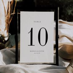 a table number is placed on top of a napkin