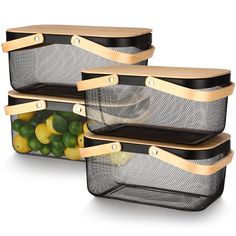 three storage baskets filled with lemons and limes