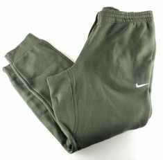 Solid Color Sports Sweats With Pockets, Cotton Joggers For Workout During Sports Season, Casual Green Moisture-wicking Sweatpants, Green Moisture-wicking Casual Sweatpants, Green Sportswear Pants For Gym, Green Sportswear Pants For Sports, Casual Green Pants For Gym, Green Sweatpants With Pockets For Sports, Nike Sporty Sweatpants For Sports Season