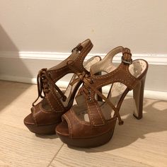 Brown Leather Heeled Sandals By Miu Miu. Super Cute. Size 36.5. In Good Condition, Bottoms Show Some Wear On Soles. Elegant Brown Sandals With 4-inch Heel, Luxury Brown Slingback Heels, Luxury Brown Sandals For Party, Elegant Brown Platform Sandals, Designer Almond Toe Platform Heels, Luxury Brown Slingback Sandals, Luxury Brown Sandals With 4-inch Heel, Luxury Brown Heels With Heel Strap, Designer Almond Toe Sandals With Reinforced Heel