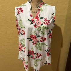 Bogo 50% Off Of Equal Or Lesser Value Item Or/And Buy 3+ Jewelry Items For $5/Piece Shoulder Seam To Hem = 30” Armpit To Armpit Seam Measurement = 22” Measurements Are Approximate ***Please Compare Measurements To A Similar Item That Fits You Well*** Mandarin Collar With V Cutout Sleeveless Tropical Floral Print With Palm Leaves Nwt (Did Not Come With Tags, Was In A Clothes Bag When Shipped From Boutique) White Tropical Top With Floral Print, White Tropical Floral Print Top, White Tropical Print Blouse For Vacation, White Summer Blouse With Tropical Print, White Tropical Print Summer Blouse, Navy Short Sleeve Tops, Black Lace Cami, Color Block Tee, Lace Trim Cami