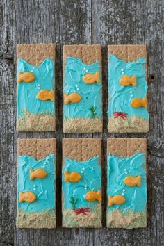 an ad for graham crackers with fish on them and the caption under the sea graham crackers