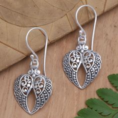 Two wings come together, forming a heart on Budiharta's beautiful dangle earrings. The Balinese artisan hand crafts the earrings from sterling silver, creating intricate, openwork designs that shimmer in a combination finish. Mandela Designs, Mandela Design, Flying Heart, Hand Crafts, Heart Motif, Filigree Jewelry, Gem Earrings, Pretty Jewelry, Silver Dangle Earrings