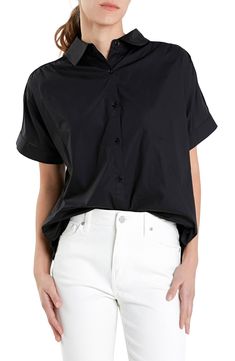 A jersey back panel adds a contrasting texture to a button-front top that's a casual yet sophisticated closet staple. Front button closure Spread collar Short sleeves 100% cotton with 68% rayon, 27% nylon, 5% spandex contrast Hand wash, dry flat Imported Business Casual Tops With Shirttail Hem And Placket, Modern Tops With Placket For Business Casual, Versatile Cotton Tops With Button Closure, Chic Business Casual Tops With Shirttail Hem, Chic Cotton Tops For Business Casual, Chic Shirttail Hem Tops For Business Casual, Modern Tops With Button Closure For Business Casual, Modern Business Casual Tops With Button Closure, Classic Business Casual Tops With Snap Buttons