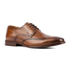 The Orton dress Oxford shoes were designed with the formal gentleman in mind. With a classic wingtip design and lace-up styling, these shoes will put the finishing touch on any outfit. Made with premium leather and carefully crafted details, you can be sure you’re making a statement without compromising on quality or performance. Classic Wingtip Derby For Semi-formal Occasions, Classic Semi-formal Derby With Wingtip, Formal Wingtip Dress Shoes, Classic Semi-formal Wingtip Derby, Formal Goodyear Welt Wingtip Derby, Formal Dress Shoes With Brogue Detailing, Classic Wingtip Lace-up Shoes For Business, Classic Semi-formal Lace-up Shoes With Goodyear Welt, Classic Wingtip Dress Shoes With Goodyear Welt