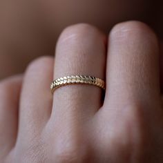 A laurel leaf ring made of 14K solid gold. An elegant choice of his and her boho natural wedding bands.  100% handcrafted with love! PRODUCT DETAILS ● Material: 14K solid gold - white gold  RING SIZING  For General Reference: ● we use standard US Ring Sizing ● an average women's ring finger is size 6 ● if your ring size is not listed please contact us HOW TO ORDER - CUSTOM ORDERS ● Choose from the drop-down menus the available options (Ring size, Metal) and leave us a note for any special requirements. ● For special orders (if you wish the ring to match an existing engagement ring) forward us pictures of the ring on a ruler from the front, side and top to mark the measurements so we can adjust the design to fit properly to your engagement ring.  PRODUCTION TIME - SHIPPING POLICIES ● Please Wedding Stackable Rings In Recycled Gold With Diamond Cut, Wedding Stackable Rings In Diamond Cut Recycled Gold, Wedding Jewelry In Recycled Gold Stamped 14k, 14k Yellow Gold Stackable Rings For Marriage, 14k Gold Diamond Cut Jewelry For Marriage, Delicate 14k Gold Jewelry For Marriage, Delicate 14k Gold Rings For Wedding, Delicate 14k Gold Rings For Marriage, Nature Wedding Band