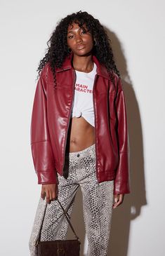 The Faux Leather Bomber Jacket from PacSun exudes a modern edge with its sleek faux leather exterior. It features long sleeves, a classic collar, a full zipper front closure, side hand pockets, an elasticized hem, and an oversized fit for a stylish, contemporary look.Faux leather exteriorLinedCollarLong sleevesFull zipper front closureSide hand pocketsElasticized hemOversized fitCoating: polyurethane; Backing: 100% polyester; Lining: 100% polyesterMachine washableModel is wearing a size small PacSun Womens Faux Leather Bomber Jacket - Red size Small Oversized Red Leather Jacket, 2024 Jacket Trends, Eyeliner Makeup Looks, Leather Jacket Outfit Fall, Red Leather Jacket Outfit, Red Jacket Outfit, Orange Jacket, Eyeliner Makeup, Fall Fit