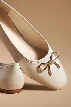 Leather upper, insole, sole Slip-on styling Imported | Metal Bow Ballet Flats by Maeve in Beige, Women's, Size: 9, Leather at Anthropologie