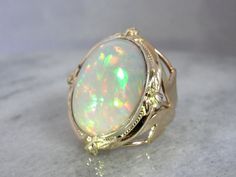 Hey, I found this really awesome Etsy listing at https://www.etsy.com/listing/188709187/our-finest-ethiopian-opal-over-25-carats Formal Multicolor Opal Ring, Multicolor Oval Opal Ring For Formal Occasions, Formal Multicolor Opal Gemstone Ring, Formal Multicolor Opal Jewelry, Opal Gold Ring, Antique Cocktail Ring, Crystal Formations, Opal Ring Gold, Rainbow Glitter