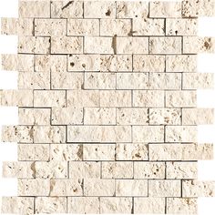 a white brick wall that is made out of stone