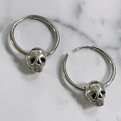 Hand crafted from sterling silver, these hoops make an incredible statement piece to add to your everyday collection. These hoops feature our signature baby skull head to add a little extra charm. Layer them with your other favorite earrings or by themselves. These do have some weight to them and would also be perfect for babes with stretched ears. Details: Solid .925 sterling silver 20 mm Latch back hoops Comes as a pair Can also be made in 14k yellow, rose and white gold upon request. Please c Baby Skull, Stretched Ears, Skull Head, Sterling Silver Hoop Earrings, Sterling Silver Hoops, Silver Hoops, Yellow Rose, Silver Hoop Earrings, Statement Pieces