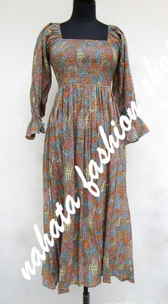 ITEM DESCRIPTION boho and hippie style maxi dress - square neckline with smocked maxi dress - long sleeve summer maxi dress Features: Long sleeve, square neck, Long dress Material: Cotton cambric Fabric: 100% cotton soft light weight ethnic print fabrics  Sleeve Length = 22 inch For more sizes & their measurement, please refer our below chart to understand the sizes variations available with us For your size requirement, please mention your size in seller note at the time of buying. SIZE MEASUREMENT  BUSTLENGTHSHOULDER XXS34 inch51 inch13.5 inch XS36 inch51 inch14 inch S38 inch51 inch14.5 inch M40 inch51 inch15 inch L42 inch51 inch16 inch XL44 inch51 inch16.5 inch 2XL46 inch51 inch17 inch 3XL48 inch51 inch18 inch   Company Return Policy:  Please write for more information to my email direc Bohemian Flowy Maxi Dress With Smocked Cuffs, Flowy Bohemian Maxi Dress With Smocked Cuffs, Bohemian Full-length Spring Dress, Billowy Bohemian Maxi Dress For Summer, Bohemian Full Length Spring Dress, Flowy Summer Maxi Dress With Smocked Cuffs, Multicolor Smock Dress For Fall, Bohemian Smocked Fitted Dress For Vacation, Bohemian Smocked Maxi Dress With Cuffs