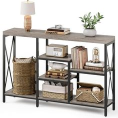 a shelf with baskets and books on it