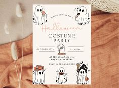 a halloween costume party with ghostes and pumpkins on it's card board