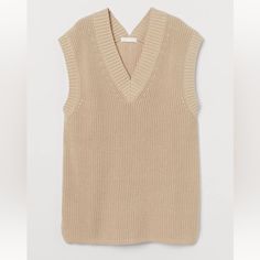 H&M Loose Fit Sweater Vest. Never Worn Still Has The Tags. Fitted Beige Sweater Vest, Beige Sweater Vest, Tan Sweater Vest, Crop Sweater Vest H&m, Trendy Beige V-neck Sweater Vest, Fitted Cream V-neck Sweater Vest, Hm Sweater, Pretty Clothing, Loose Fit Sweater